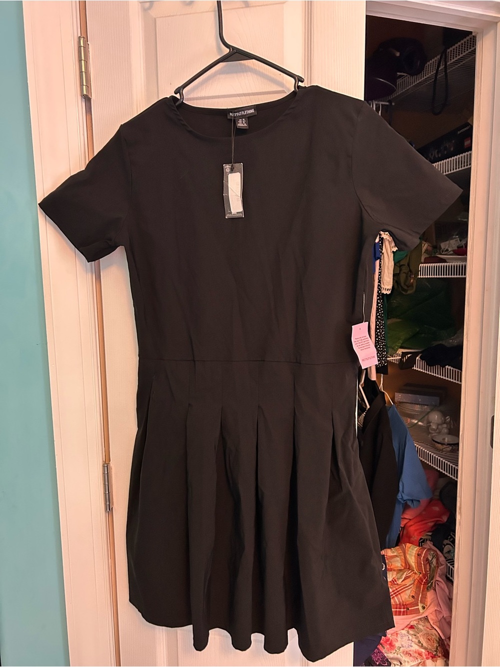 PrettyLittleThing Black Short Sleeve Pleated Skirt Dress